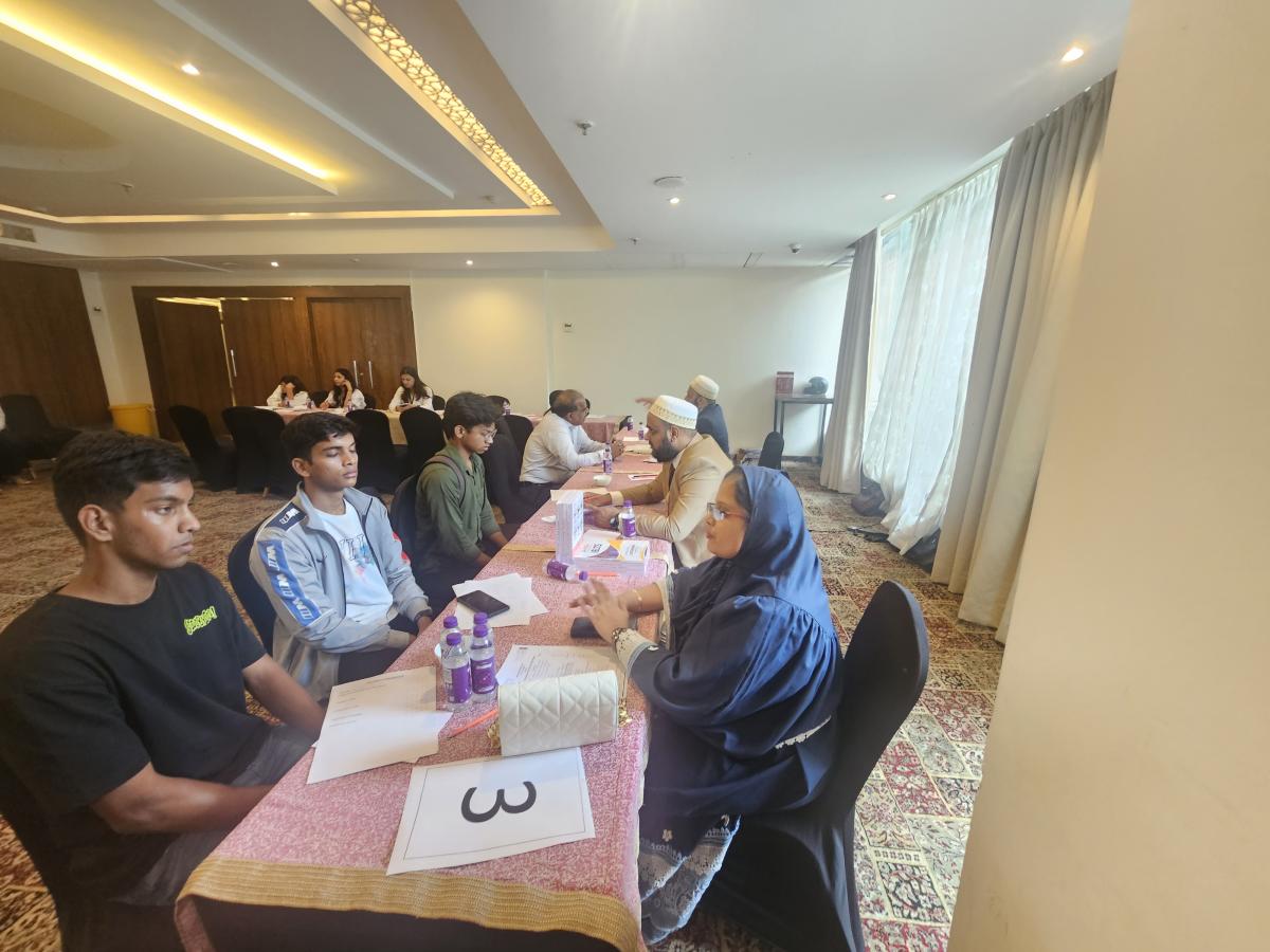 Students receiving one-to-one education guidance at a Trans Globe Indore counselling event
