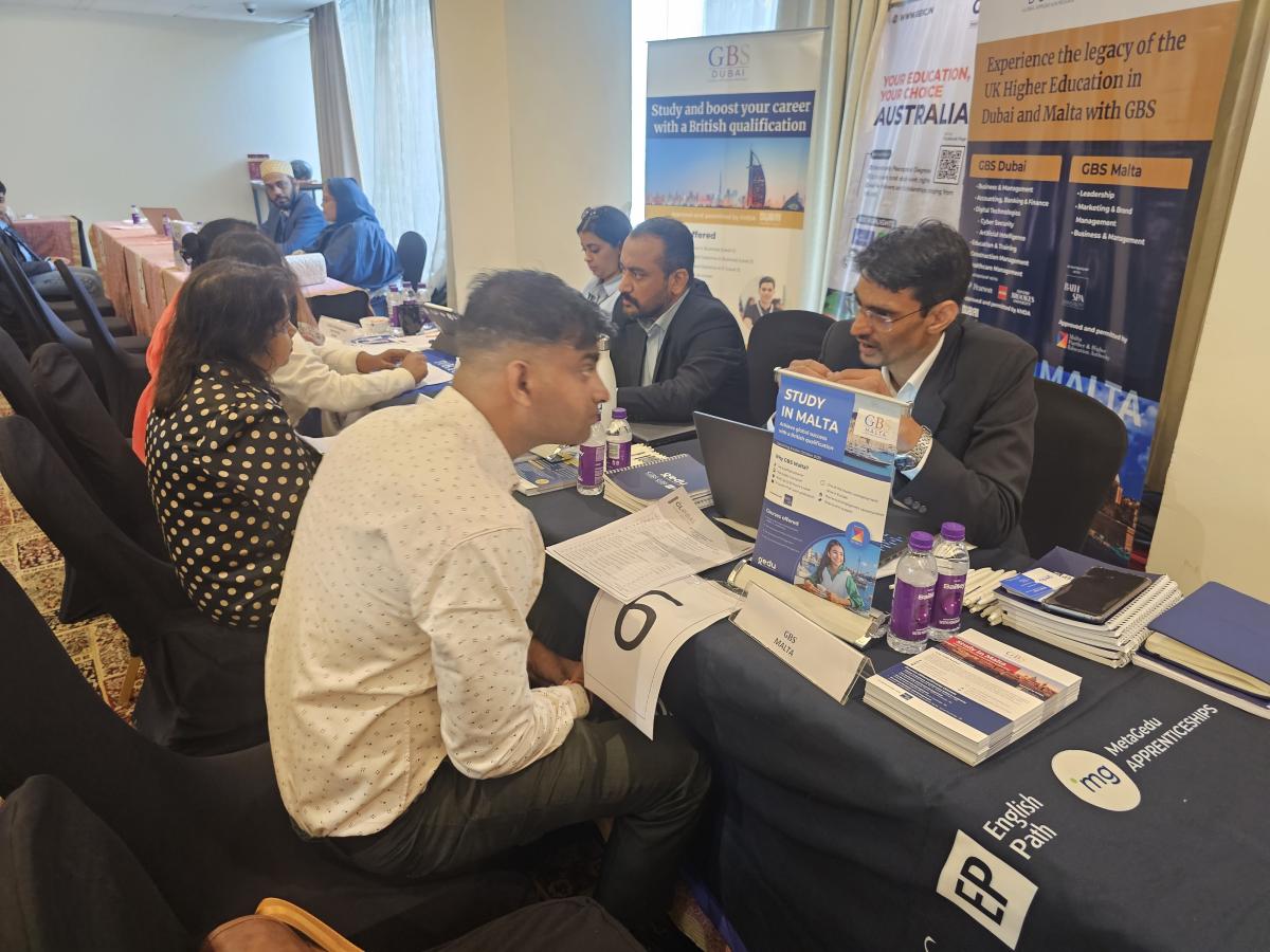 GBS Malta representative discussing courses with prospective students